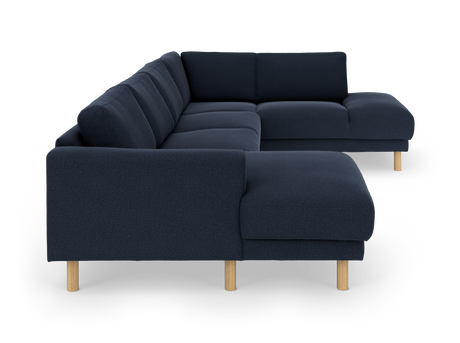 Mørkeblå hjørnesofa med træben.