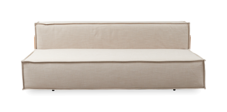 Beige armløs modulsofa med rene linjer og synlige kanter, fotograferet direkte forfra på hvid baggrund.