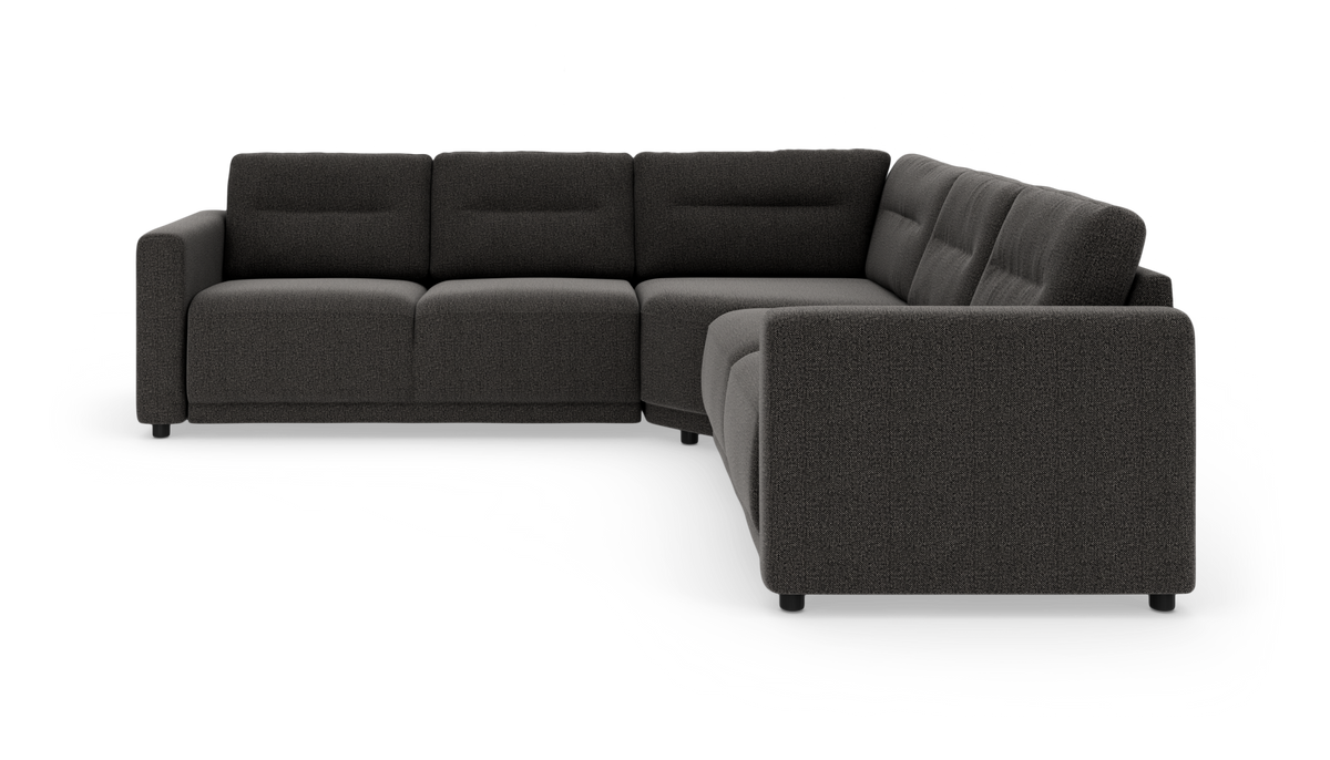 Mørkegrå L-formet modulsofa i stof, produktbillede på hvid baggrund.