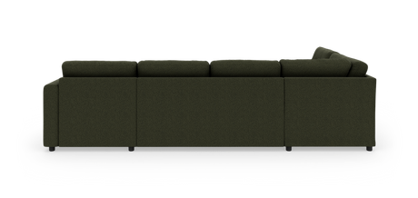 Mørkegrøn modulsofa i stof set bagfra på hvid baggrund.