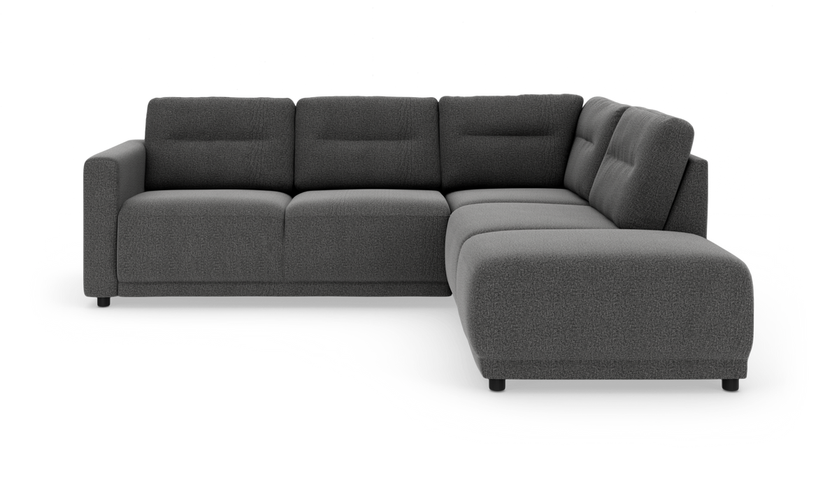 Mørkegrå L-formet modulsofa med chaiselong til højre, vist mod hvid baggrund.