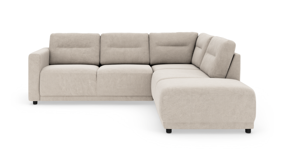 Beige L-formet hjørnesofa med chaiselong og riflet betræk, produktfoto på hvid baggrund.