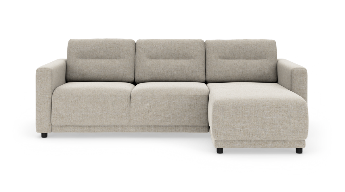 Beige modulsofa med chaiselong til højre, set forfra på hvid baggrund.