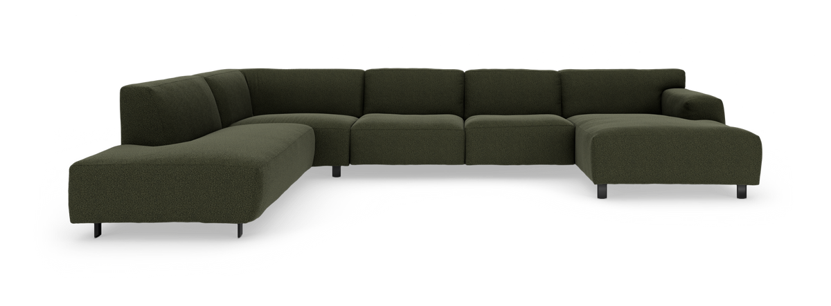 Modulær mørkegrøn hjørnesofa med chaiselong, isoleret på hvid baggrund.