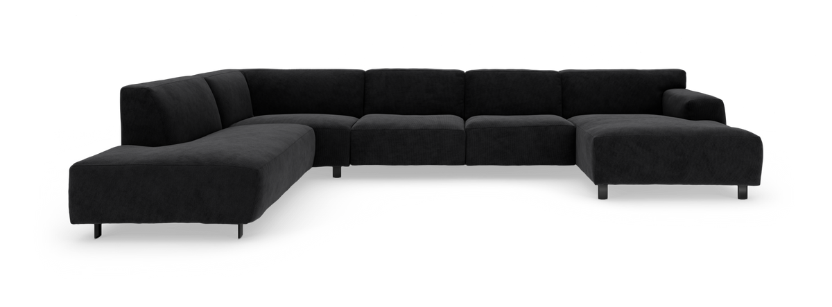 Stor modulsofa i mørkegråt, ribbet stof, U‑form med chaiselong til højre, fritlagt på hvid baggrund.