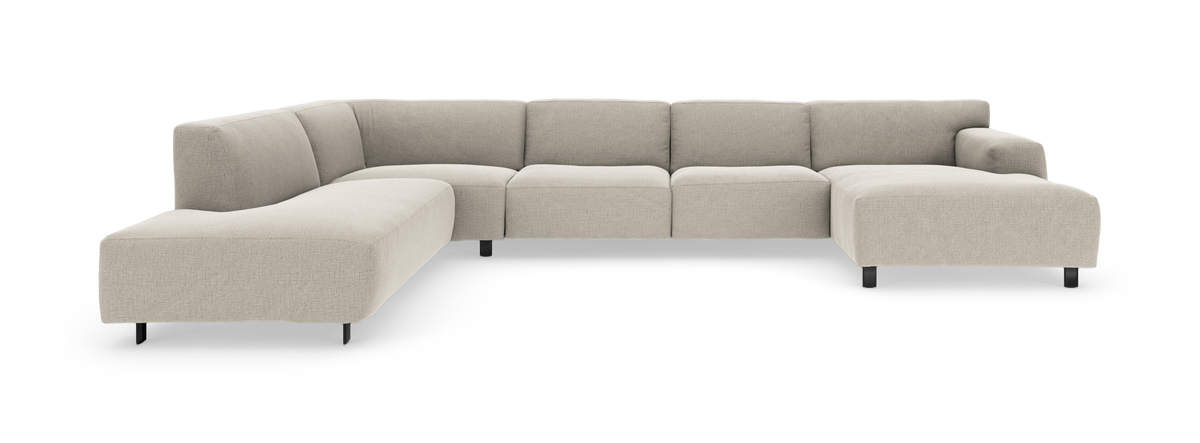 Modulær hjørnesofa i beige stof med højre chaiselong, fotograferet mod neutral baggrund.