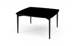 Sort spisebord med organisk trekantet bordplade og slanke ben, frilagt.