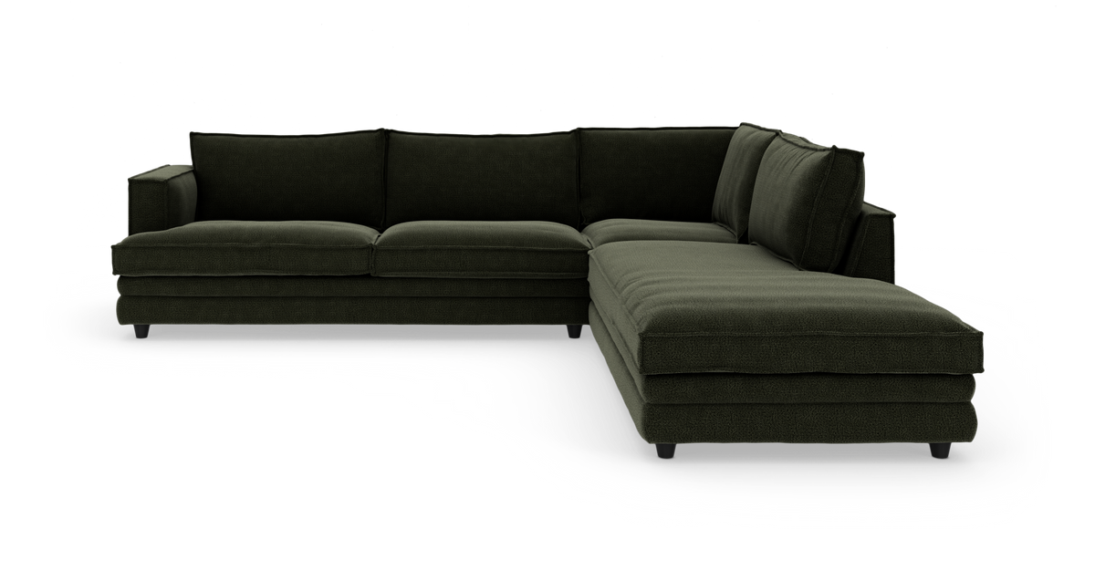 Mørkegrøn L‑sofa med højrevendt chaiselong, fritlagt på hvid baggrund.