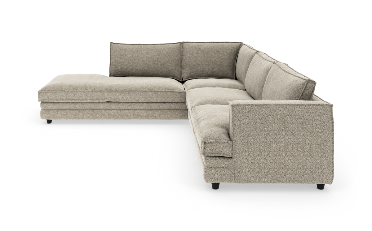 Beige L‑formet modulsofa med chaiselong venstre, fritlagt på hvid baggrund.