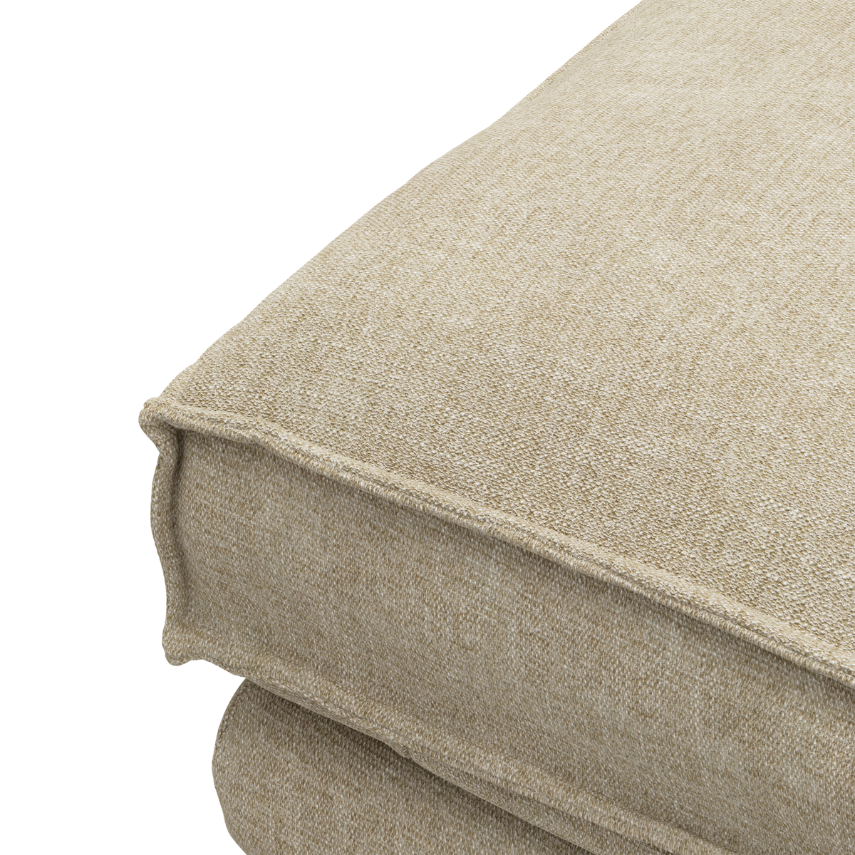 Nærbillede af beige sofahynde i tekstureret stof.