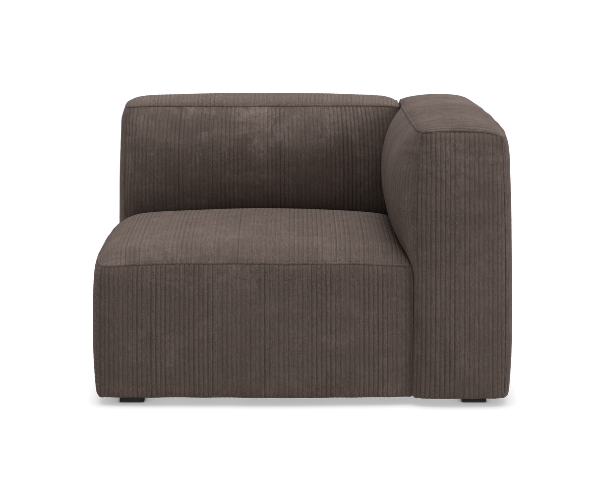 Brun modulsofa hjørnemodul i bred fløjl/corduroy, frilagt på hvid baggrund.