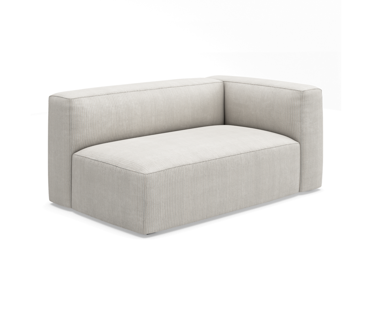 Lys beige modulsofa med afrundede hjørner på sort sokkel, frilagt produktbillede.