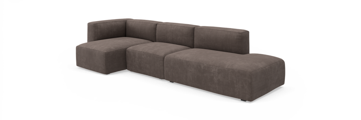 Modulær L‑formet hjørnesofa i brun corduroy med lav ryg og afrundede former, fritlagt på hvid baggrund.