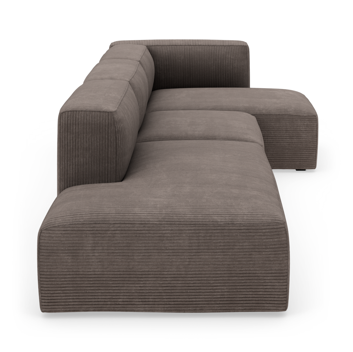 Modulsofa i brungrå bredriflet fløjl med chaiselong, vist i studieopsætning.