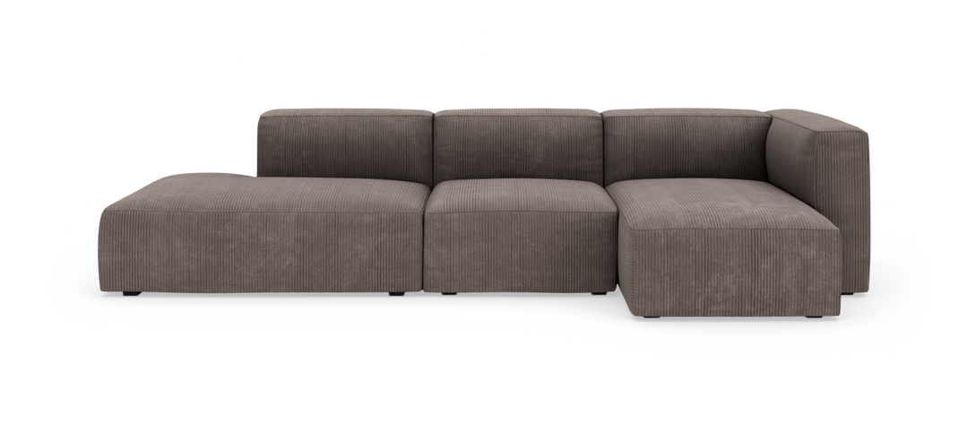 Modulær chaiselong-sofa i brungrå bredriflet fløjl, frilagt på hvid baggrund, set forfra.