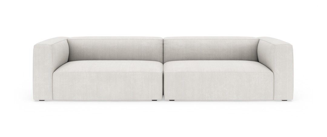 Lys beige modulsofa med to sæder, rene linjer og brede armlæn på hvid baggrund.