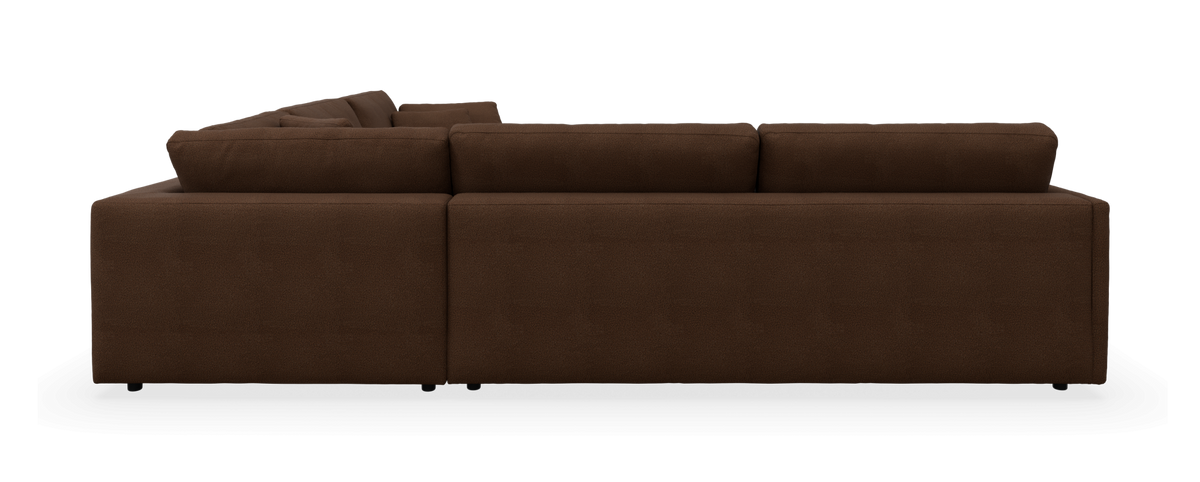 Brun modulsofa set fra siden med lave ryghynder.