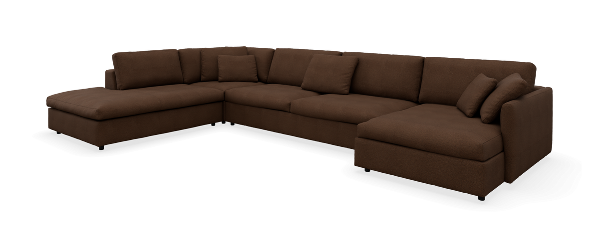 Stor brun U-formet modulsofa med dobbelte chaiselonger og puder, frilagt.