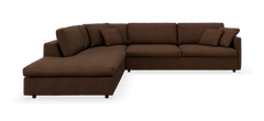 Brun L‑formet modulsofa med venstre chaiselong og løse puder, frilagt mod sort baggrund.