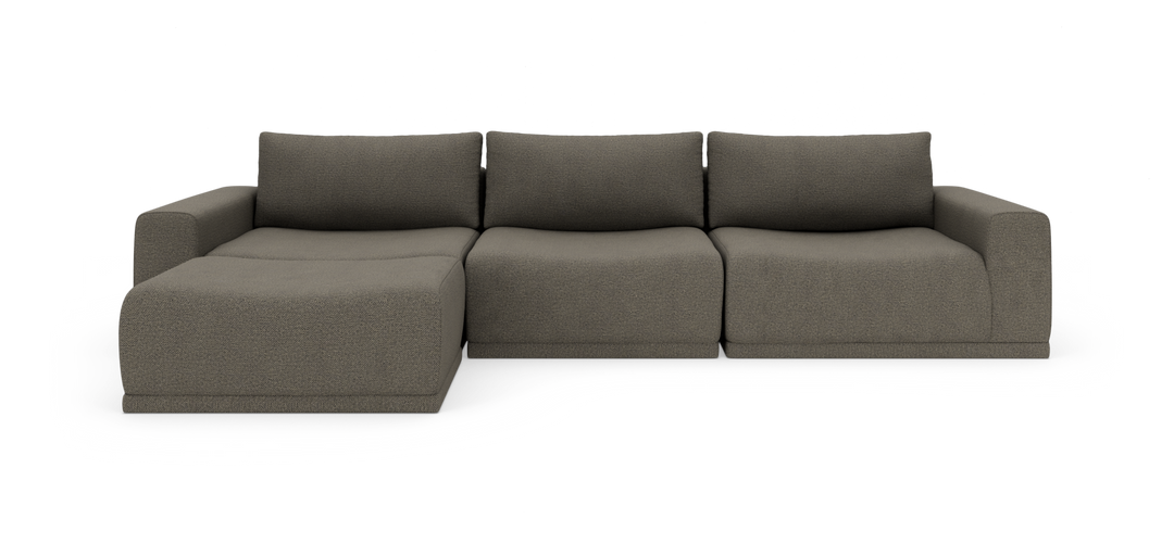 Tremoduls sofa med venstre chaiselong i taupegråt stof på hvid studiobaggrund.