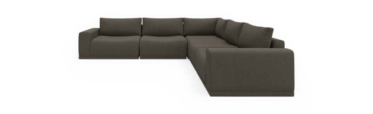 Modulær L‑formet hjørnesofa i mørkegråt stof, vist mod sort baggrund.