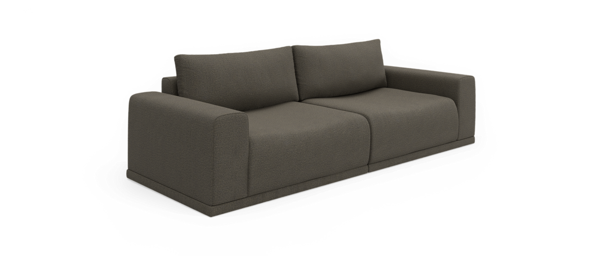 Mørkegrå moderne 3-personers sofa med brede armlæn og to store ryghynder, frilagt på hvid baggrund.