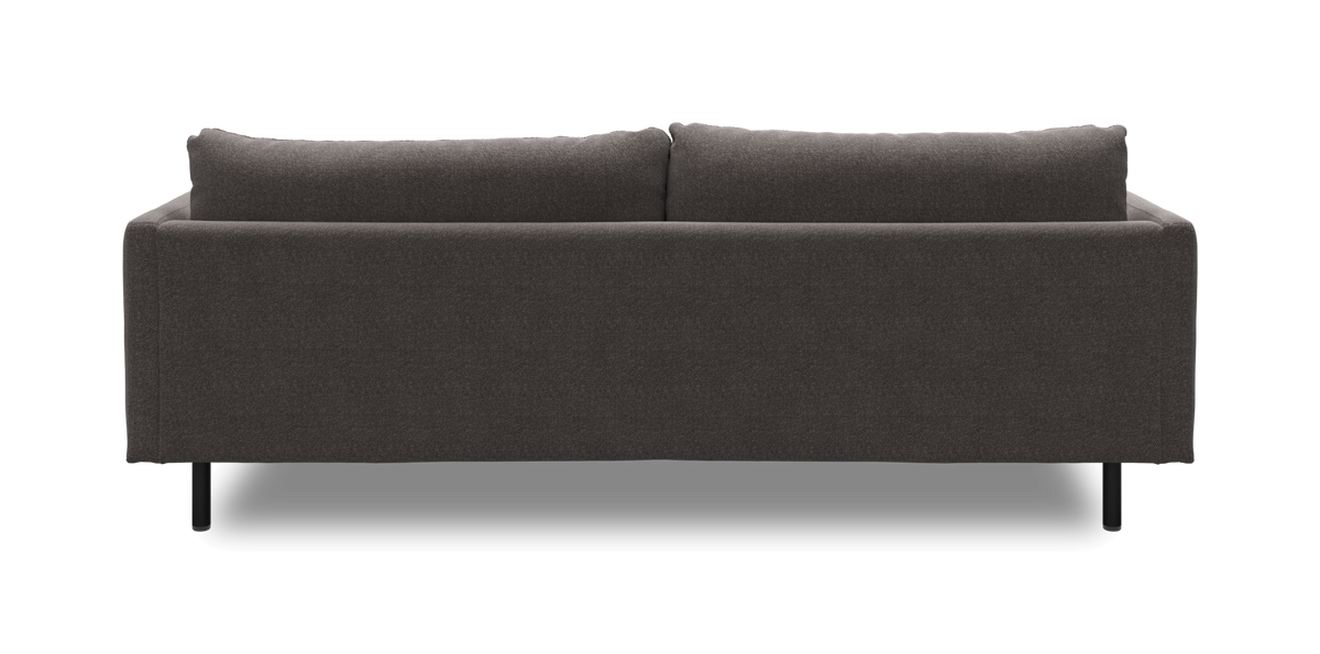 Mørkegrå sofa set bagfra mod hvid baggrund.