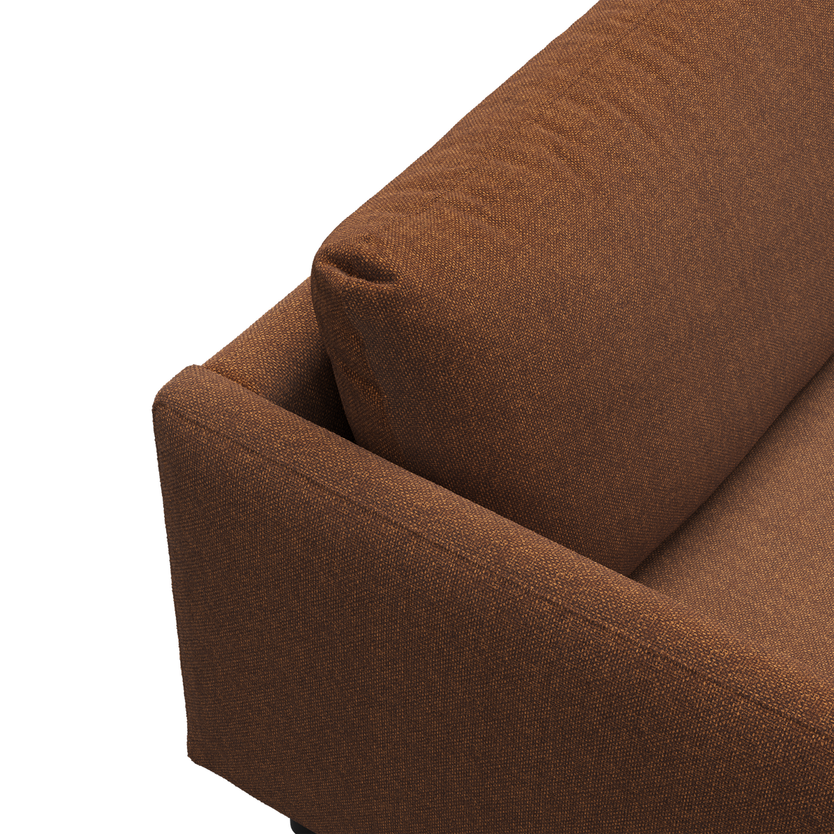 Nærbillede af brun stofsofas armlæn og ryghynde.