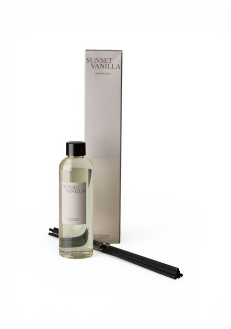 "Sunset Vanilla" duftpinde-refill med sorte pinde og æske.