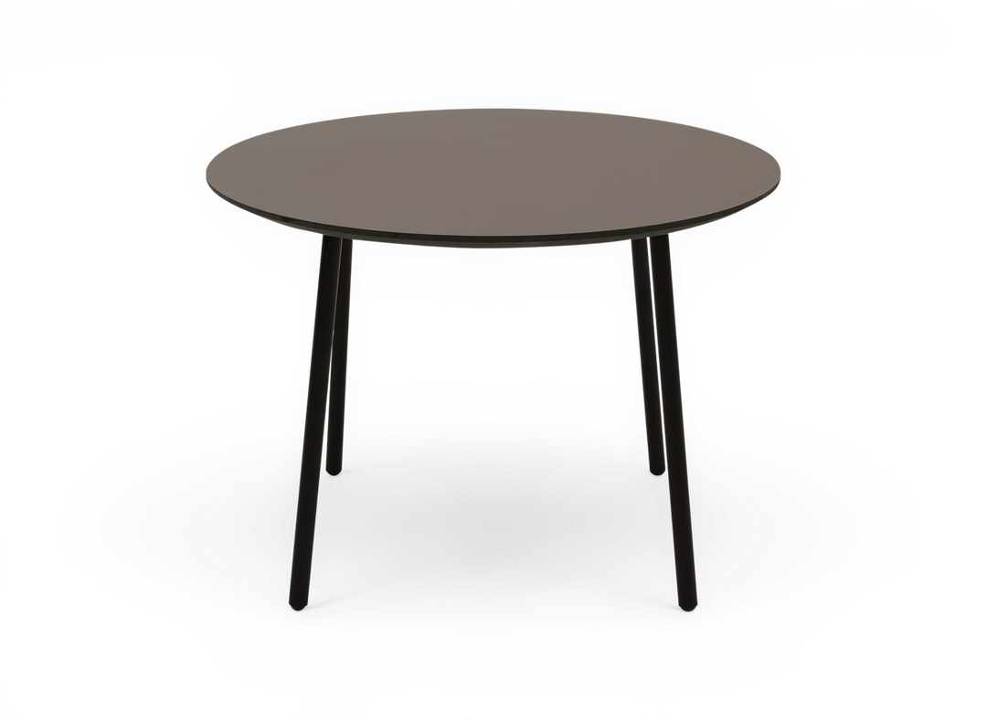 Rundt moderne bord med slankt sort stel og mat taupegrå bordplade.