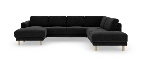 Sort modulær hjørnesofa i stof med chaiselong til venstre og åben afslutning til højre, runde ben i lyst træ.