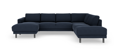 Mørkeblå modulær hjørnesofa med chaiselong til venstre og kromben, fritlagt på hvid baggrund.