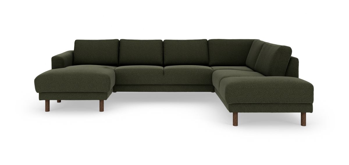 Mørkegrøn modulsofa i U‑form med chaiselounges på begge sider og træben, frilagt på hvid baggrund.