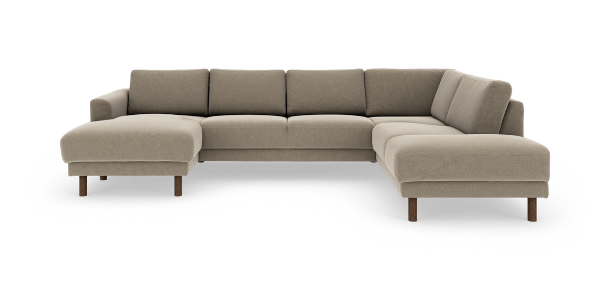 Beige U-formet modulsofa med chaiselong til venstre og åben afslutning til højre, runde træben.