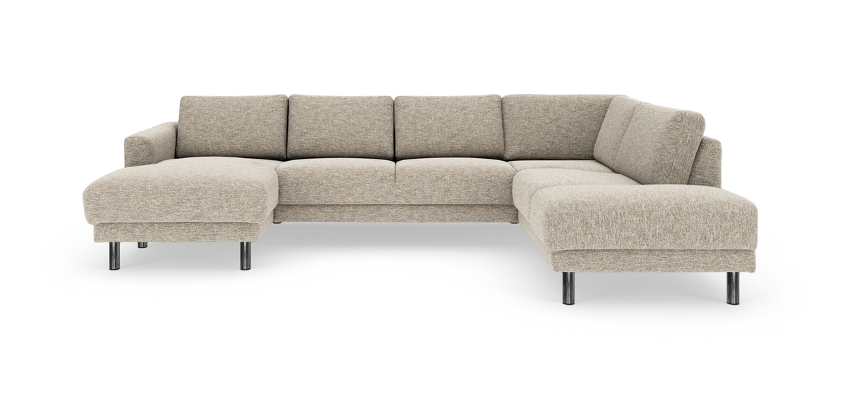 Beige L-formet modulsofa med chaiselong og kromben, frilagt på hvid baggrund.