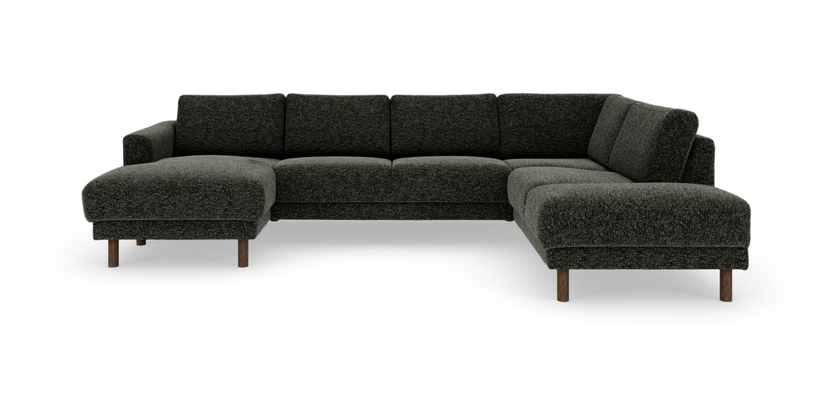 Stor U-formet modulsofa i mørkegrønt/mørkegråt stof med chaiselonger på begge sider og runde træben.
