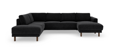 Sort L-formet hjørnesofa med chaiselong til højre og runde træben, frilagt på hvid baggrund.