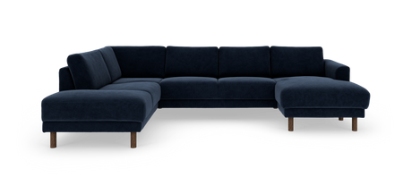 Mørkeblå hjørnesofa i velour/strukturstof med højre chaiselong og træben, frilagt produktbillede på hvid baggrund.