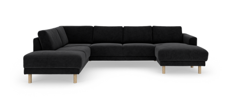 Sort L-formet hjørnesofa med chaiselong til højre og lyse træben, fritlagt på hvid baggrund.