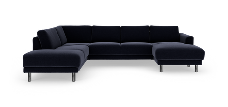 Mørkeblå modulsofa i U‑form med chaiselong til højre og kromben, frilagt på hvid baggrund.