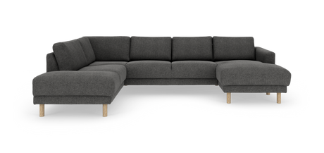 Mørkegrå modul-hjørnesofa med chaiselong til højre og lyse træben, frilagt på hvid baggrund.