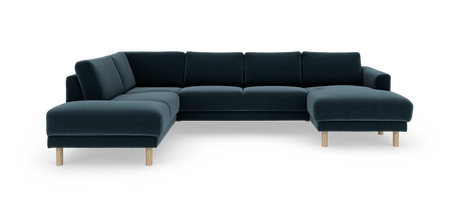 Mørkeblå hjørnesofa med chaiselong til højre og runde træben, frilagt på hvid baggrund.