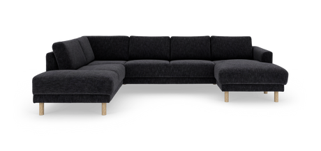 Mørkegrå modulsofa i U‑form med chaiselonger i begge ender og lyse træben, frilagt på hvid baggrund.