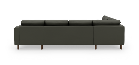 Mørkegrøn hjørnesofa set bagfra på hvid baggrund.