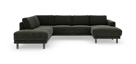 Mørkegrøn L‑sofa med chaiselong og kromben, frilagt produktbillede.