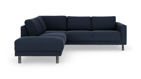 Mørkeblå L‑sofa med metalben, frilagt på hvid baggrund.