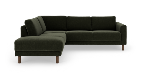 Mørkegrøn L‑sofa med venstrevendt chaiselong, boucléstof og mørke træben.