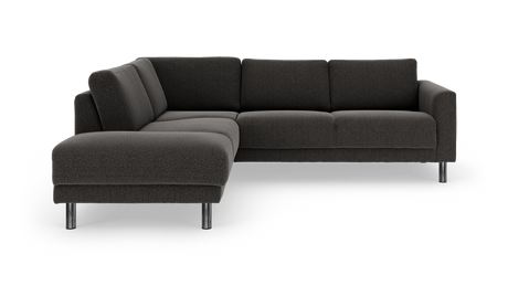 Mørkegrå L‑formet hjørnesofa med kromben på hvid baggrund.