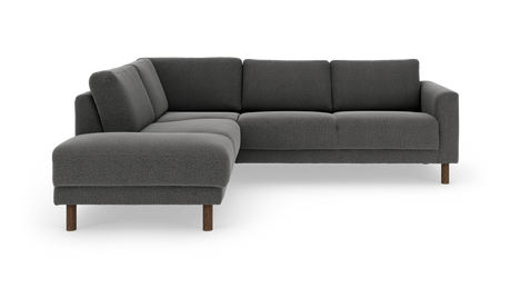 Mørkegrå L‑sofa med venstre chaiselong og runde træben, frilagt studiebillede.