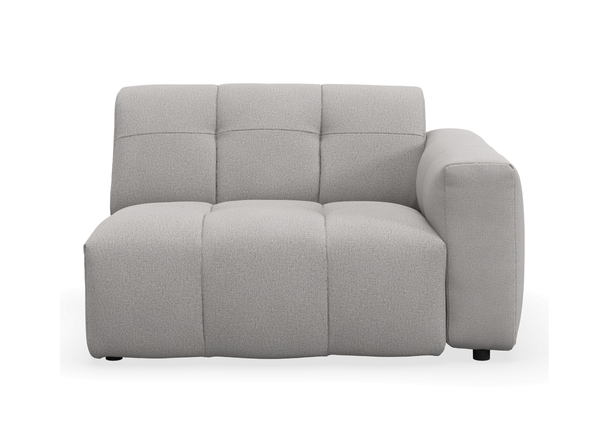 Lysegrå modulsofa med højre armlæn set forfra.